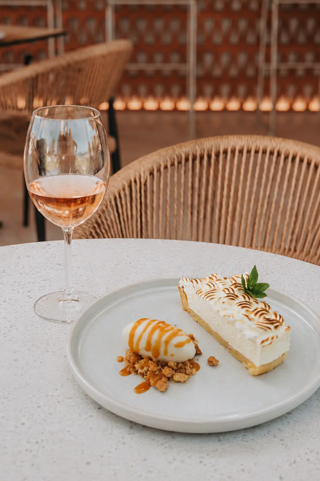 Lemon meringue tart with rosé wine and caramel ice cream